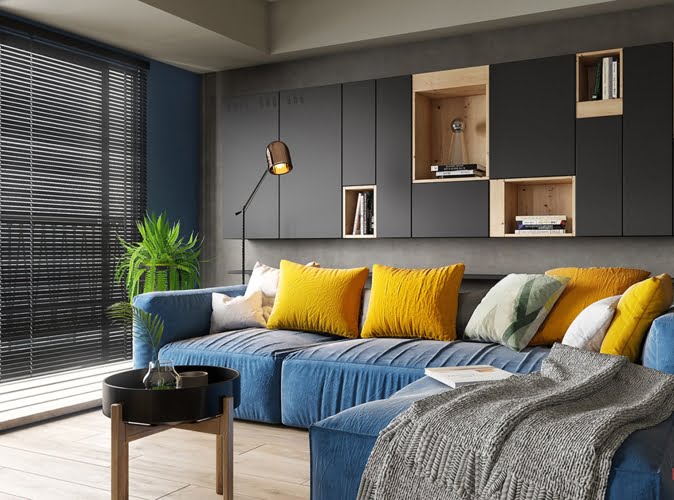  Để không gian luôn cân bằng, một bức tường màu xám đã được sử dụng phía sau ghế sofa.