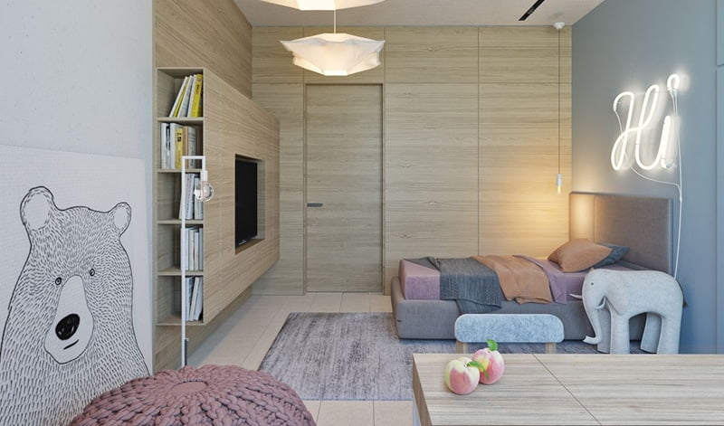 Ấn tượng với phòng ngủ của trẻ có bức tranh hình chú gấu được dán ở bên trái tường nhà. 